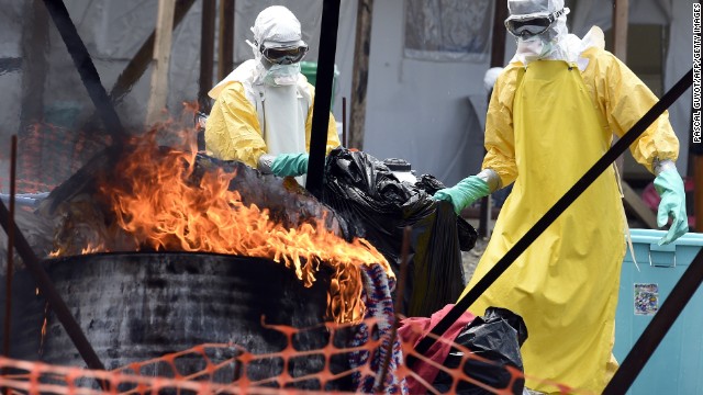 Medical staff members at the Doctors Without Borders facility in Monrovia burn clothes belonging to Ebola patients on Saturday, September 27. 