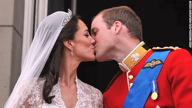 Their Royal Highnesses Prince William, Duke of Cambridge, and Catherine, Duchess of Cambridge, kiss on the balcony at Buckingham Palace after their wedding ceremony on April 29, 2011, in London. 