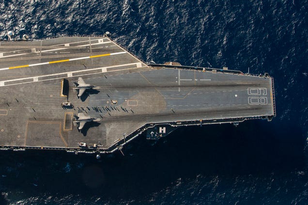 Extraordinary overhead photo of two F-35s on an aircraft carrier