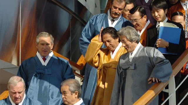 In Busan (2005), South Korea, APEC members agreed to confront pandemic health threats, such as bird flu, and to appear not at all uncomfortable with the high-waisted flair of traditional Korean hanbok.