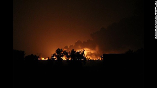 A Baiji oil refinery burns after an alleged ISIS attack in northern Selahaddin, Iraq, on Thursday, July 31.