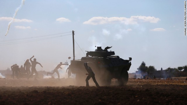 Turkish Kurds clash with Turkish security forces during a protest near Suruc on Monday, September 22. According to <a href='http://ift.tt/1ujGnUv' target='_blank'>Time magazine</a>, the protests were over Turkey's temporary decision to close the border with Syria.