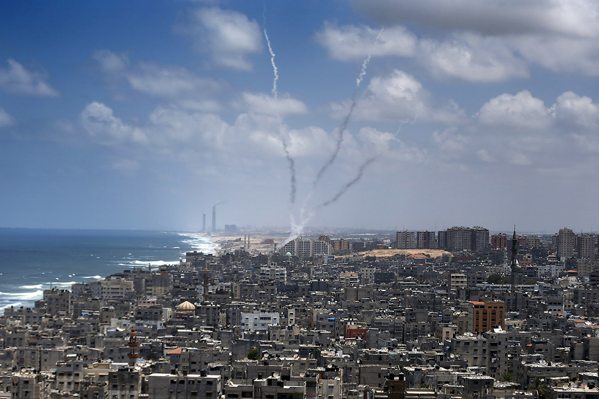 Rockets fired from Gaza City are launched towards Israel.