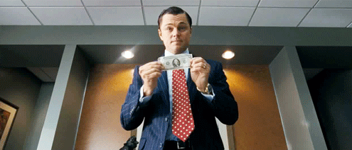 Animated gif of Leonardo DiCaprio crumpling up a piece of paper and throwing it in the waste basket.