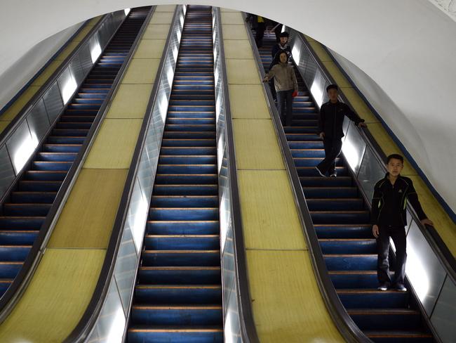 Relatively empty escalators. Picture: EPA/Franck Robichon
