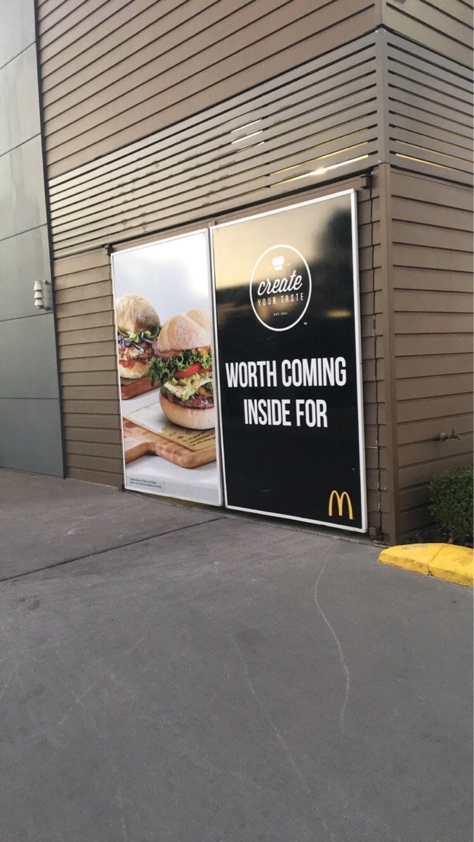 funny fail image McDonald's new hamburger sign is sexually suggestive