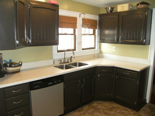 black painted kitchen cabinets with double sink