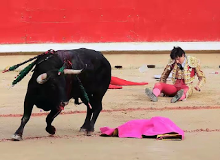 Teenage bullfighter at Pamplona bull festival Spain 