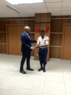 Tony Elumelu meets UBA security guard who returned $10,000 