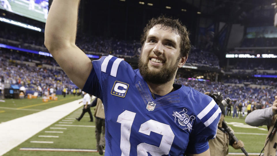 Indianapolis Colts quarterback Andrew Luck (12) celebrates after beating the Kansas City Chiefs 45-44, at an NFL wild-card playoff football game Saturday, Jan. 4, 2014, in Indianapolis. (AP Photo/Michael Conroy)