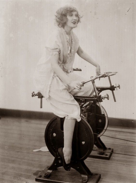 Woman on Old-Fashioned Stationary Bike