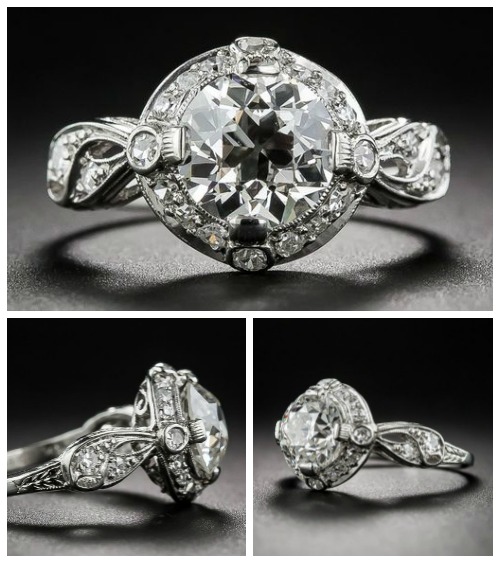 A beautiful antique Art Deco engagement ring with a 1.62 carat center diamond and lovely, loopy, ribbon-like shoulders. At Lang Antiques.