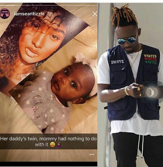 Sean Tizzle shows off his babymama and daughter
