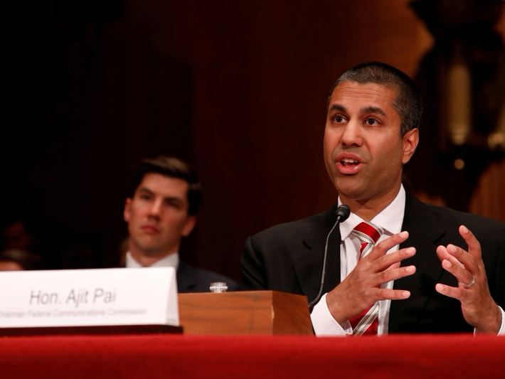 FILE PHOTO: Ajit Pai, Chairman of the Federal Communications Commission, testifies before a Senate Appropriations Financial Services and General Government Subcommittee on Capitol Hill in Washington, DC, U.S., June 20, 2017. REUTERS/Aaron P. Bernstein/File Photo