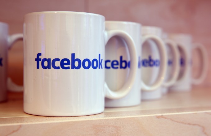 BERLIN, GERMANY - FEBRUARY 24: Coffee mugs adorned with the Facebook logo stand at the Facebook Innovation Hub on February 24, 2016 in Berlin, Germany. The Facebook Innovation Hub is a temporary exhibition space where the company is showcasing some of its newest technologies and projects. (Photo by Sean Gallup/Getty Images)