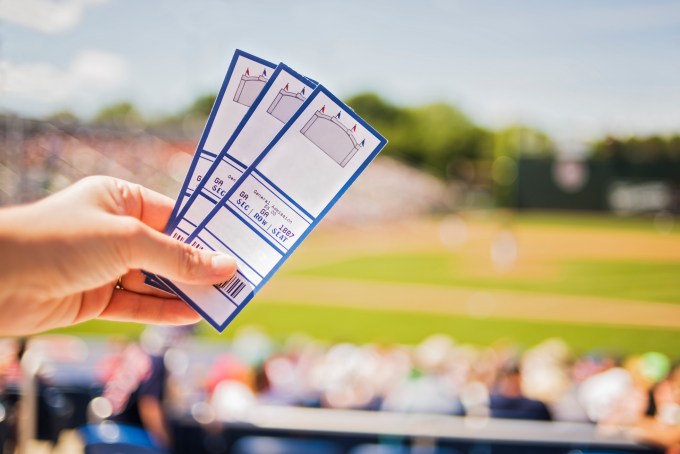 USA, Maine, Portland, Close-up of hand holding tickets at stadium