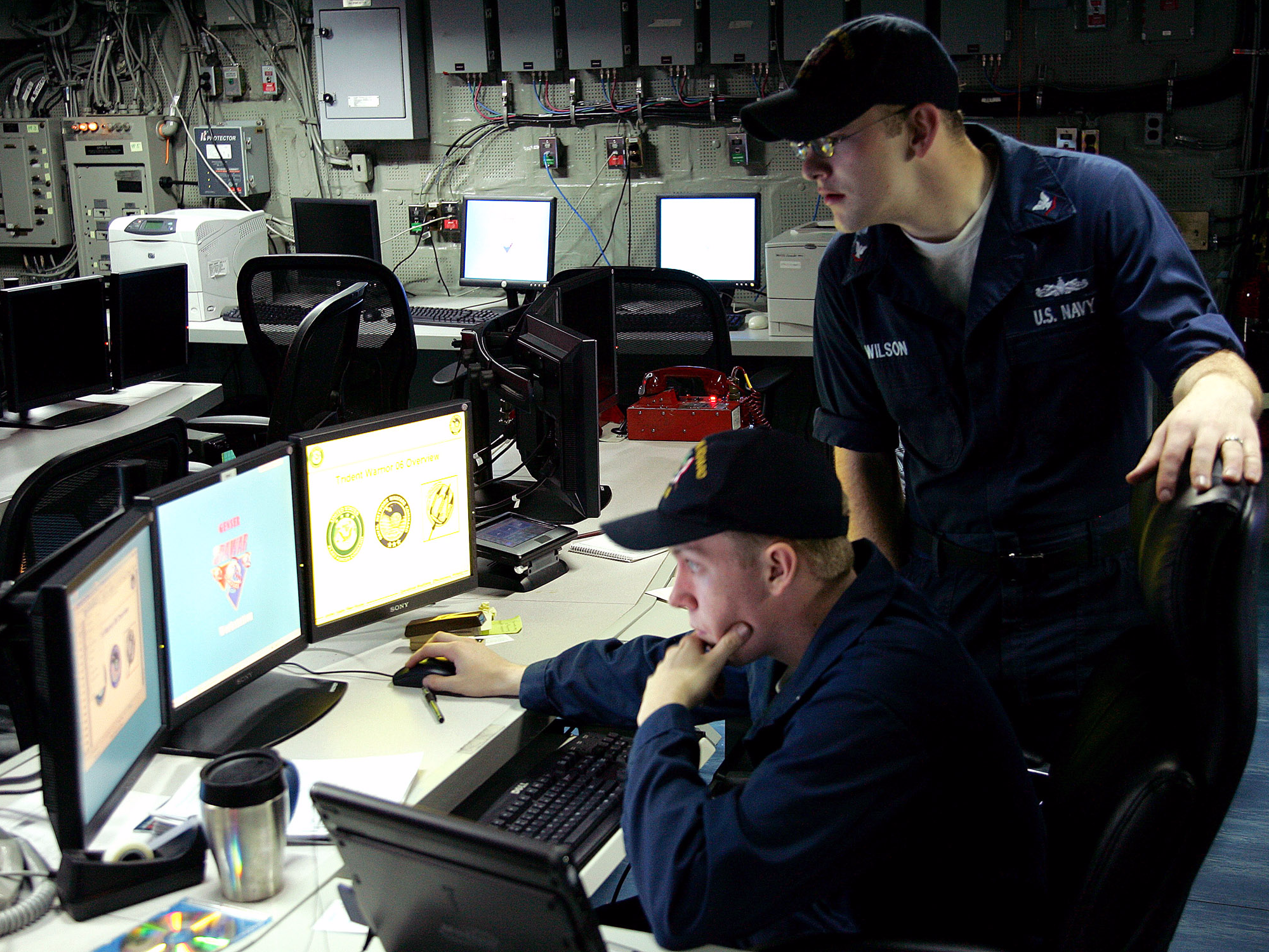 US Navy sailors at computer