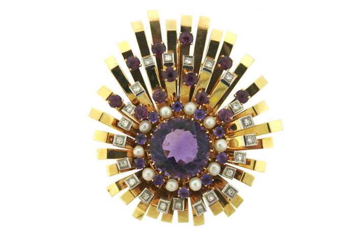 This glamorous retro brooch features amethyst, tourmaline, pearls, and diamonds in gold. At Oakgem.