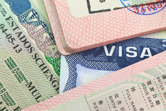 Chinese, USA and Shengen European visas in passports