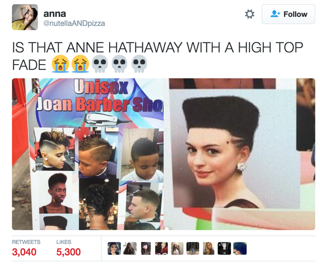 People are hella confused after images started floating around online of a barbershop sign featuring what looks to be a photoshop of Anne Hathaway with a hi-top fade haircut.