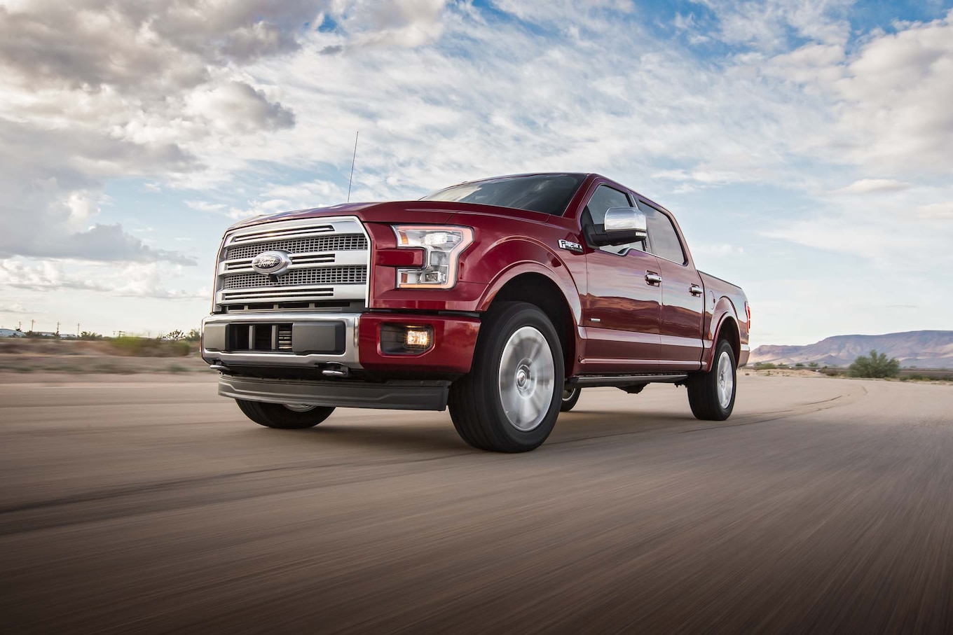2017 Ford F 150 Platinum 4x4 EcoBoost front three quarter in motion 04
