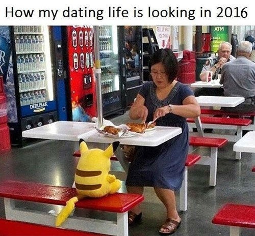 woman dines alone with a stuffed pikachu