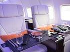 How a Flight on the Four Seasons Private Jet Compares to a Commercial Plane