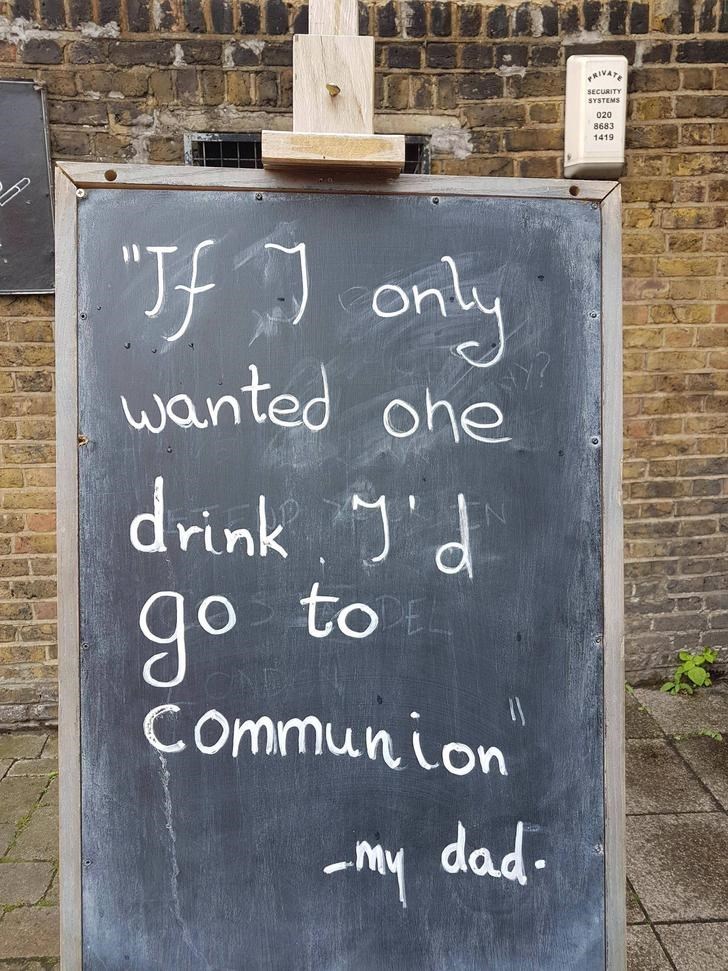 Funny pub sign with a dad joke about how if he wanted one drink he'd just go to church for communion wine.