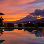 Sunset over the pool at Lembeh Resort offers a stunning view of Lembeh Strait.