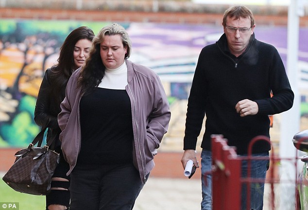 Ms Johnson (left), who sat at the back of the court with her father (right), wept as her ex-partner was led away
