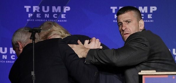 Donald Trump was rushed offstage by members of his Secret Service detail during a rally Nov. 5 in Reno, Nev., after a person in the crowd shouted that someone had a gun.