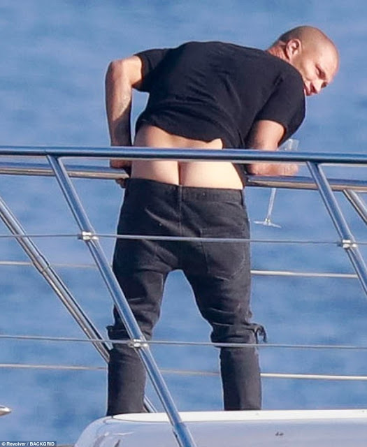 Jeremy Meeks flashes bare bum as he makes out with Chloe Green onboard yacht