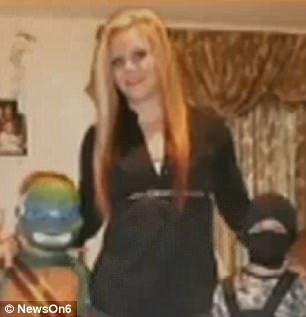 Court documents state Stevens, pictured with the victim and his twin brother, struck her son with a hammer and whipped him with a belt