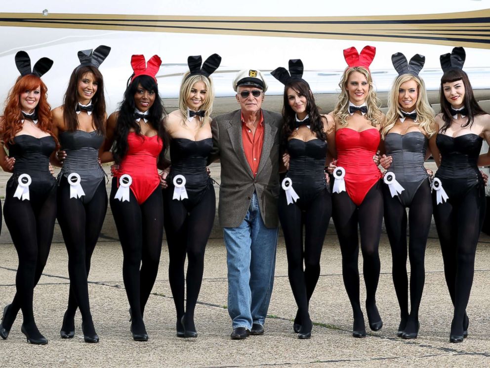 PHOTO: Playboy founder Hugh Hefner (centre) arrives at Stansted Airport, June 2, 2011, in Stansted, England.