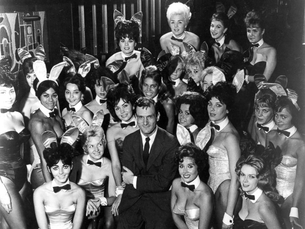 PHOTO: Hugh Hefner poses with Playboy Bunnies at one of the early Playboy Clubs, in 1962.