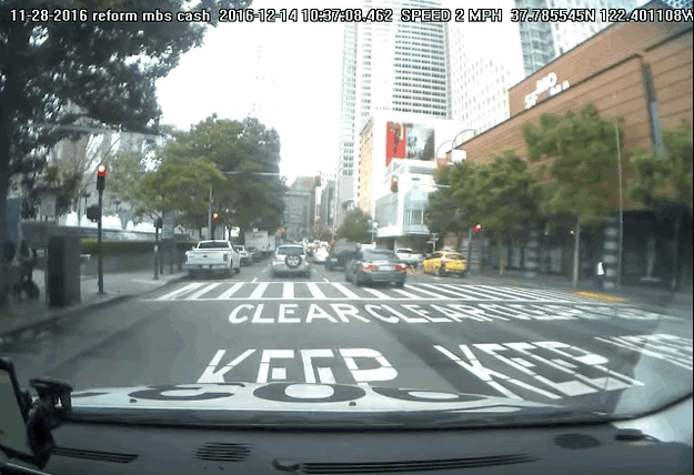 ... and here's where what appears to be an Uber self-driving car blows right past it.