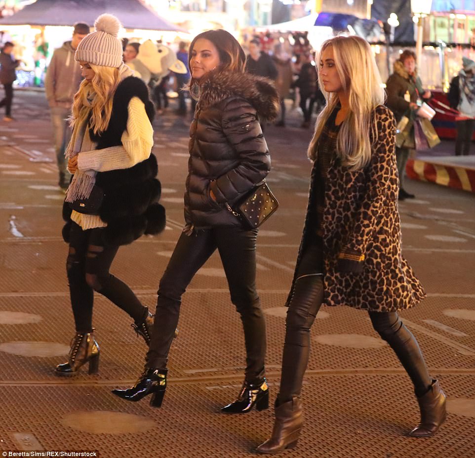 Three's company: Lottie, Emily and Nicola were seen strolling through the scene 