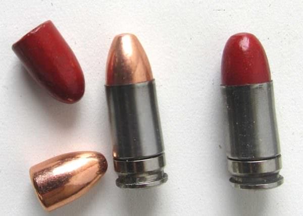 The Acme Bullet Company bullet is a cast item with a red coating which tends to make them slick and aids in feeding.