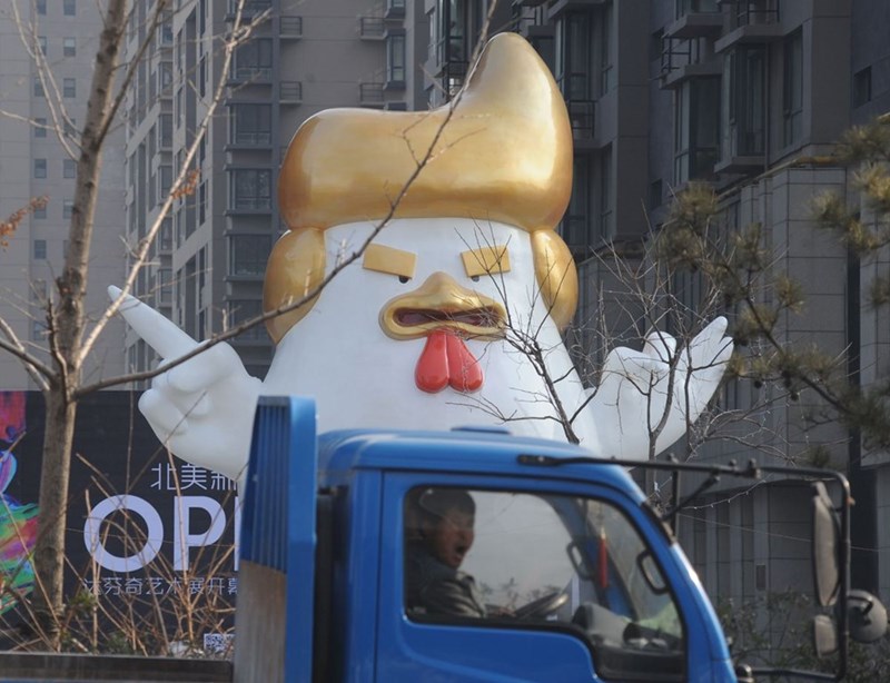 chinese artist unveils giant trump rooster for chinese new year at shopping mall