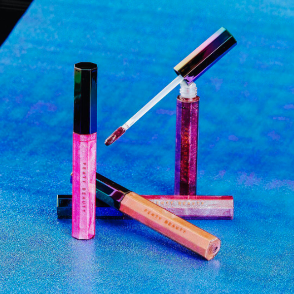 If you're more of a gloss person, the Cosmic Gloss Lip Glitter also comes in four shades. Each color is "packed with iridescent glitter and drenched in mirror-like shine."
