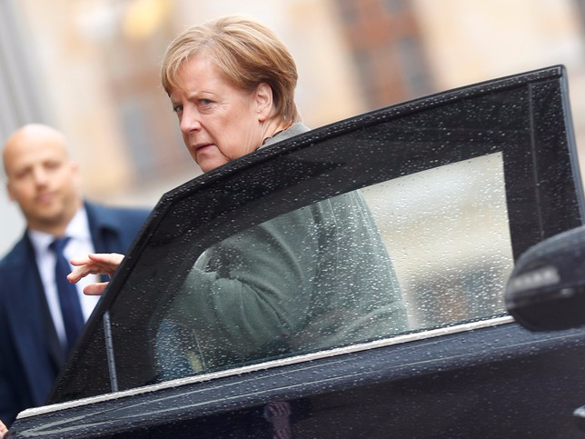 Angela Merkel, leader of the Christian Democratic Union (CDU), arrives at the German Parliamentary Society offices before the start of exploratory talks about forming a new coalition government in Berlin, Germany November 2, 2017. REUTERS/Hannibal Hanschke
