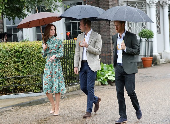 Kate Middleton wore Prada Printed silk dress, Monica Vinader Gold Vermeil Earrings and LK Bennett Fern pumps. Prince Harry
