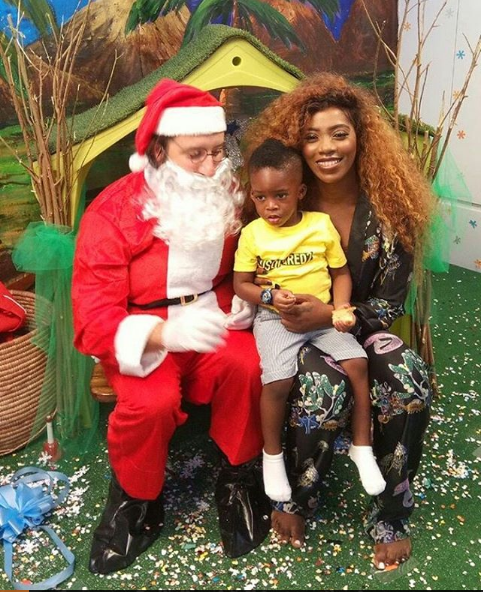 Photos: Tiwa Savage and Jamil pose with Santa