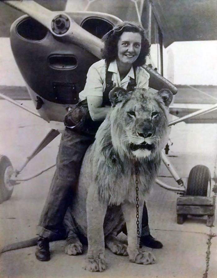 My Grandmother With Sultan, Her Favorite Lion From Her Troop, In Front Of Her Plane She Flew Just After WW2 (1947)