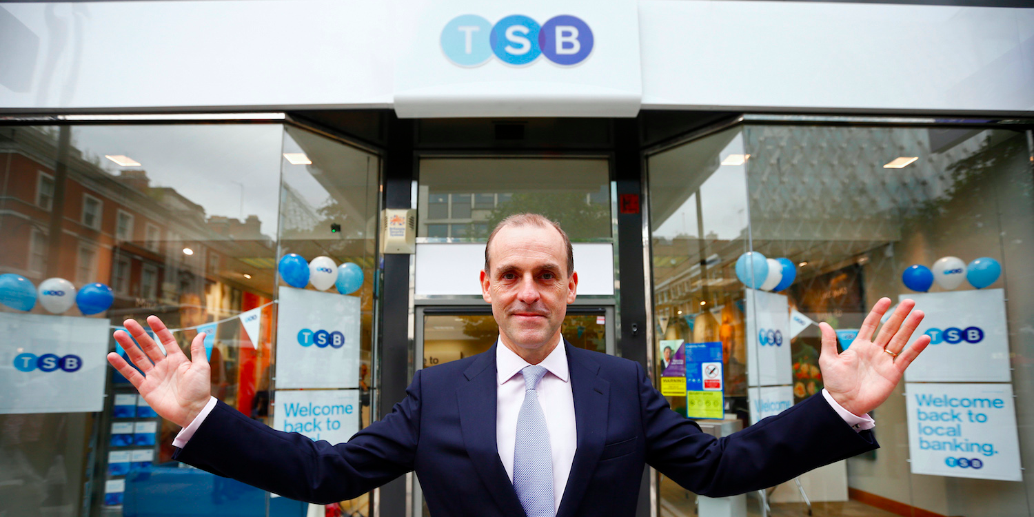 Chief Executive of the TSB bank, Paul Pester, poses outside the bank's Baker Street branch in London September 9, 2013. Britain's 200-year-old TSB bank returned to the high street on Monday after an 18-year absence, the result of action by regulators and the government to introduce greater competition for the country's banks following several consumer scandals.
