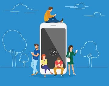 Vector graphic of young people using smartphones, sitting and standing on and around a giant smartphone.