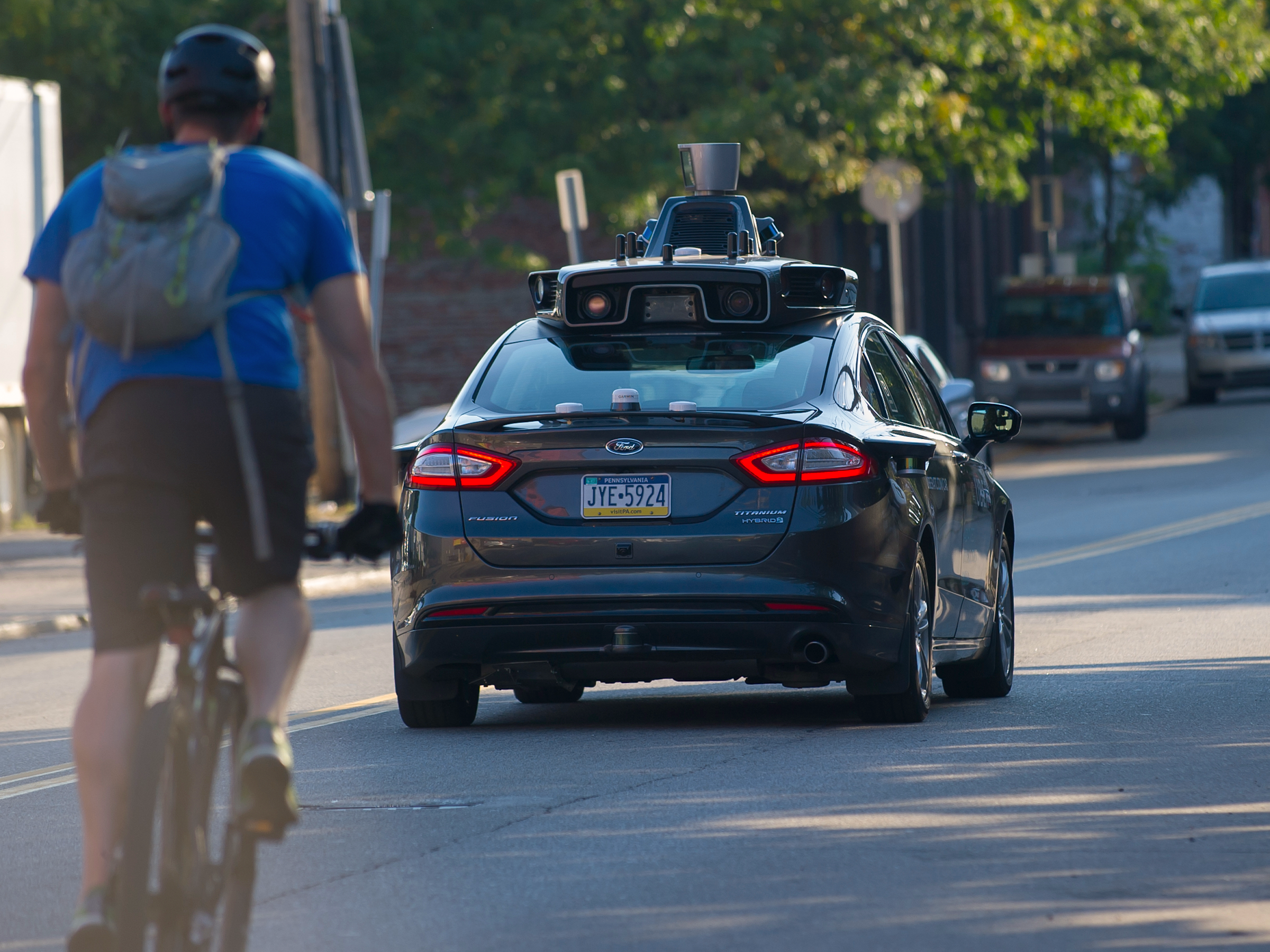 uber self-driving autonomous car vehicle biker cyclist biking