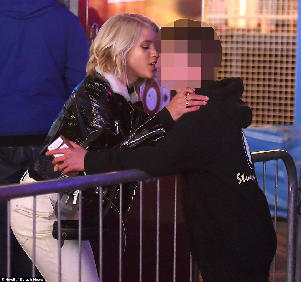 Lucky boy! Sofia was seen planting a kiss on the cheek of a young fan