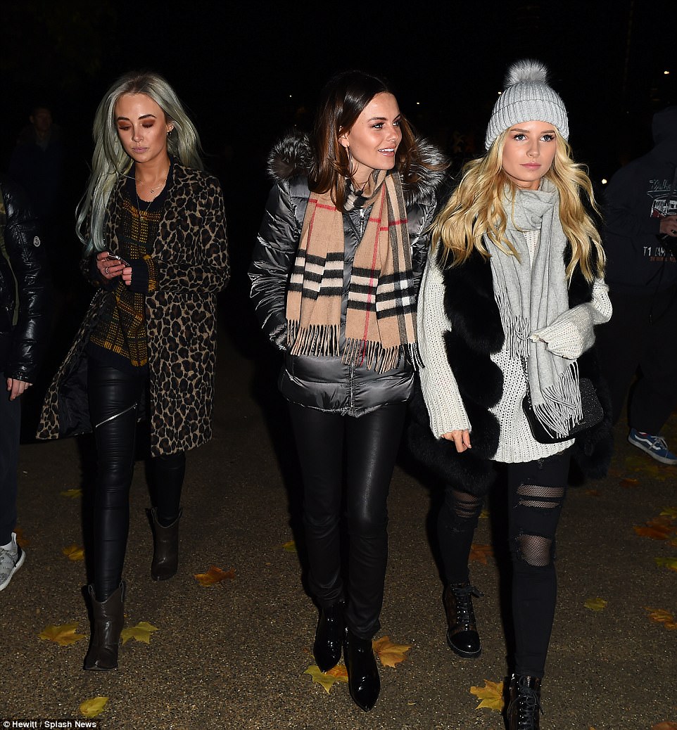 Three's company: Nicola Hughes, Emily Blackwell and Lottie Moss strode arm in arm 