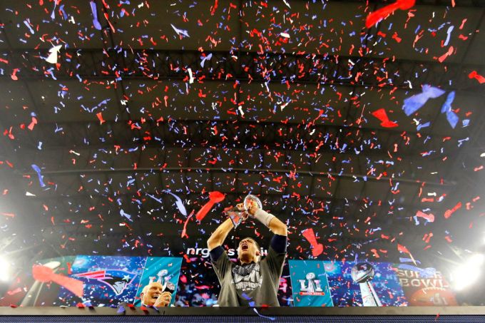 HOUSTON, TX - FEBRUARY 05: Tom Brady #12 of the New England Patriots celebrates with the Vince Lombardi Trophy after defeating the Atlanta Falcons during Super Bowl 51 at NRG Stadium on February 5, 2017 in Houston, Texas. The Patriots defeated the Falcons 34-28. (Photo by Kevin C. Cox/Getty Images)